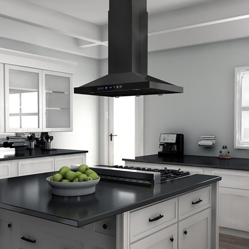 kitchen island with a gas cooktop and hood