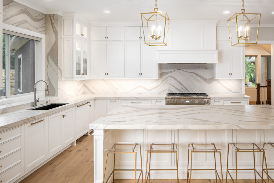 Large island and kitchen surround with quartz countertop