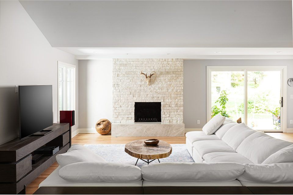 large stone fireplace, taj mahal quartzite with a mitered edge, homes that rock