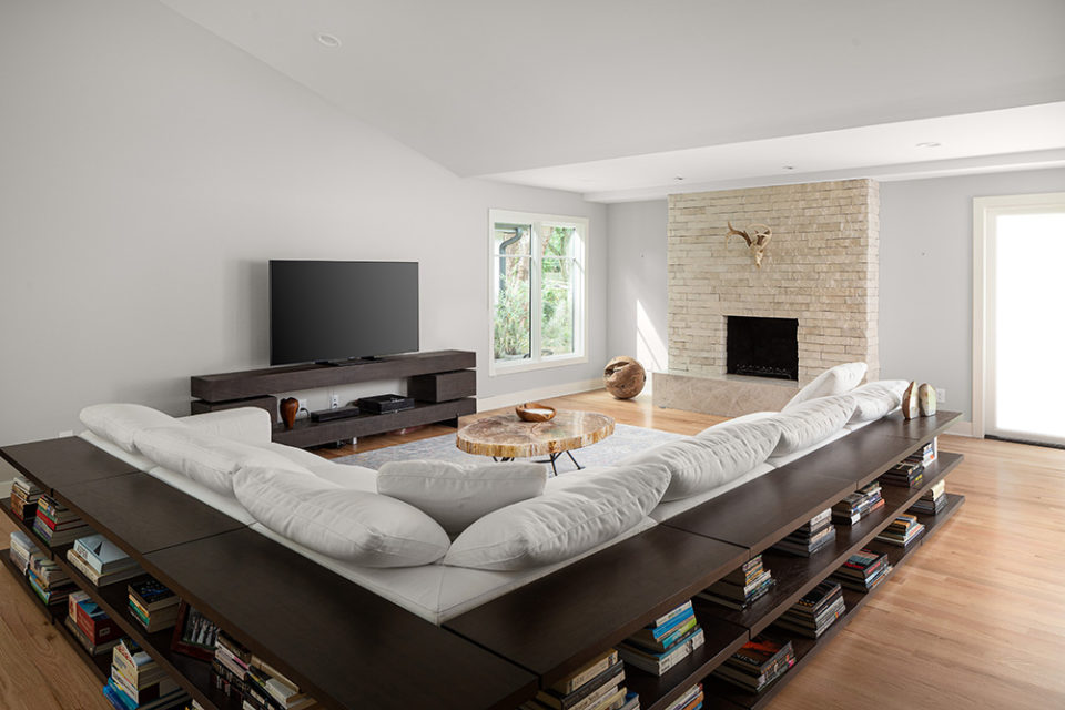 homes that rock, living room with stone fireplace, mitered edge, taj mahal